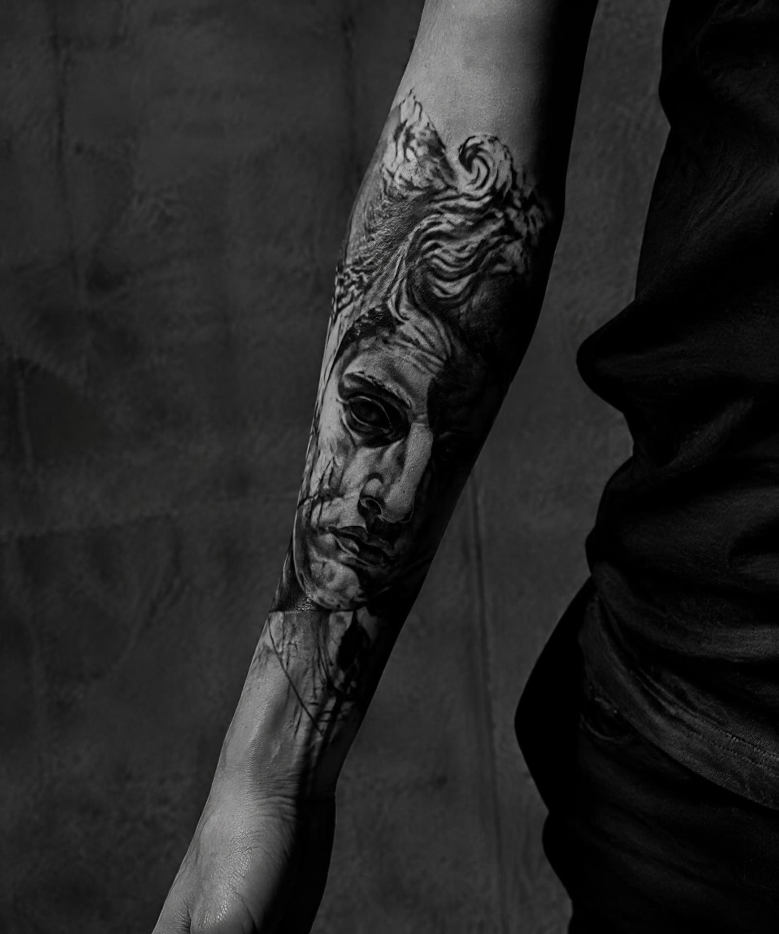 Black and grey sculptural forearm piece
